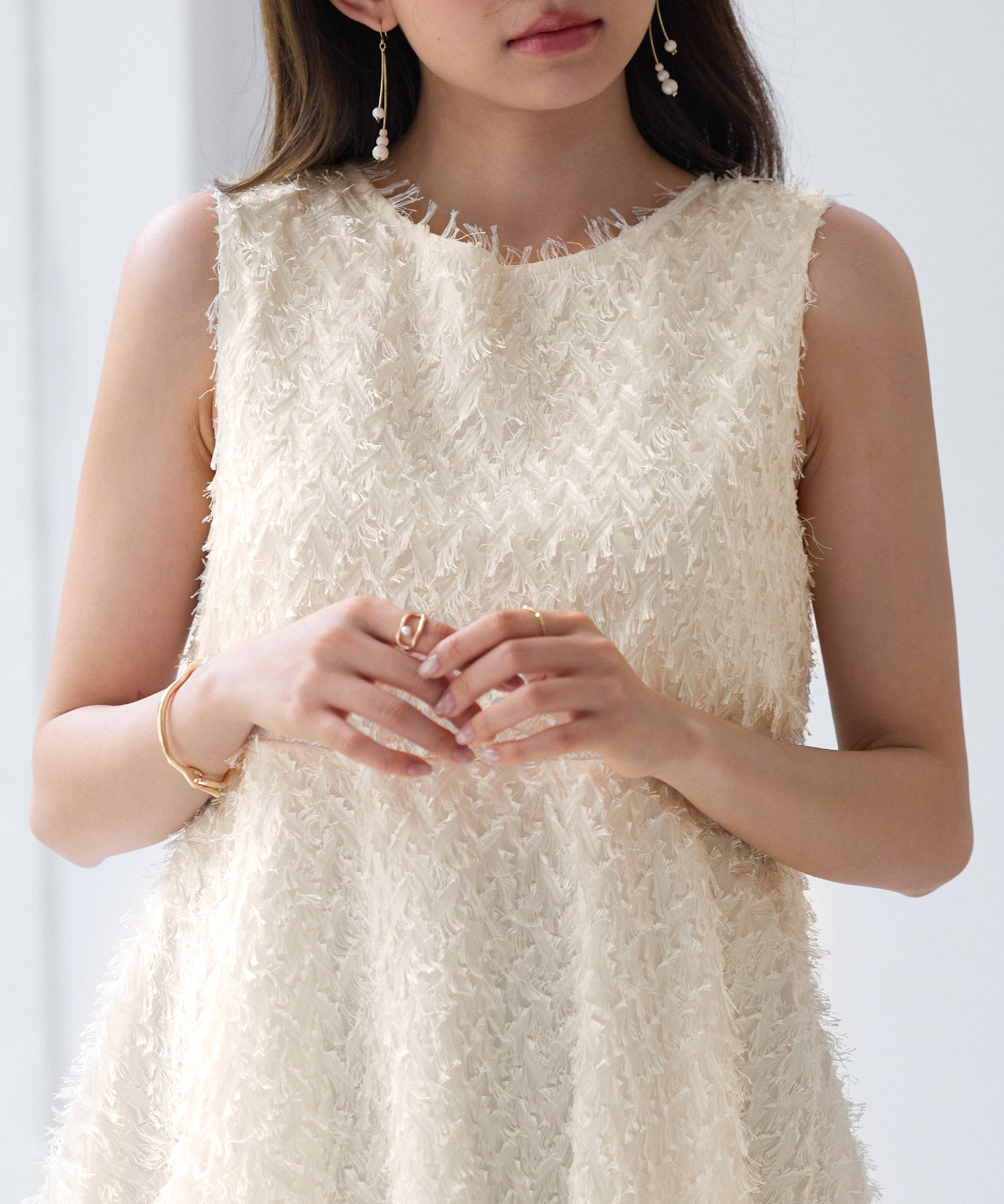 シャギー風ぺプラム裾ノースリーブトップスsdp0280 アイボリー