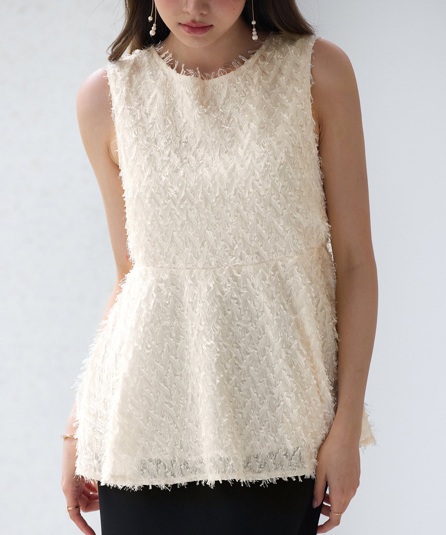 シャギー風ぺプラム裾ノースリーブトップスsdp0280 アイボリー