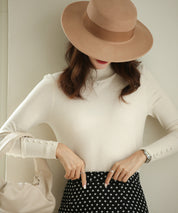 パールボタン付きプチハイネックニットプルオーバーxyf2150 アイボリー